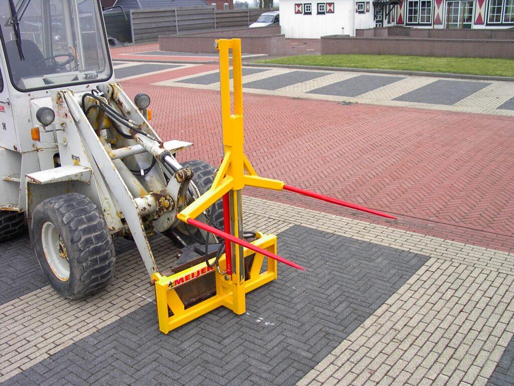 Mini-hefmast balenprikker op compacte lader